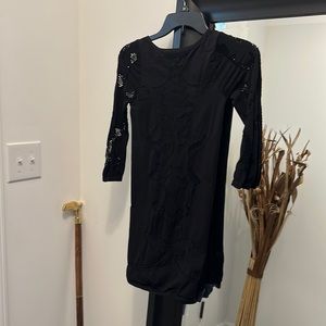 Black like new 3/4 sleeve form fitting dress by Intimately Free People. XS / S